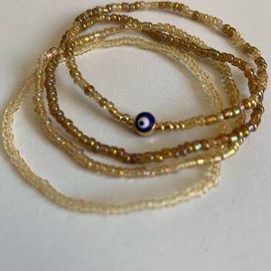 Host Pick! Gold stackable evil eye bracelet set